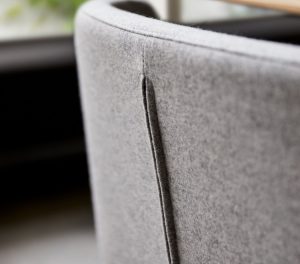 Close up of back stitch detail on the Coalesse Wrapp Chair